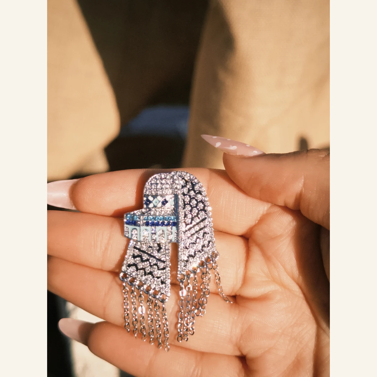 Sparkling Dome Pendant Necklace held in hand to show its size
